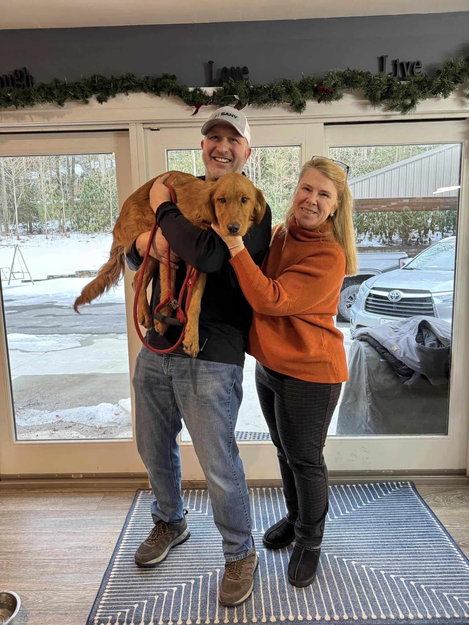 senior couple and dog