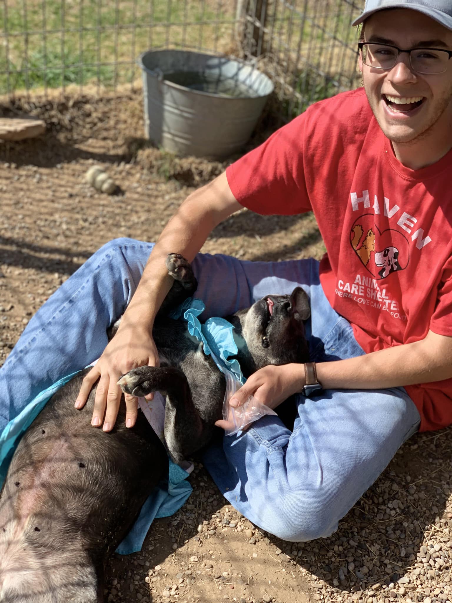 black dog and happy man