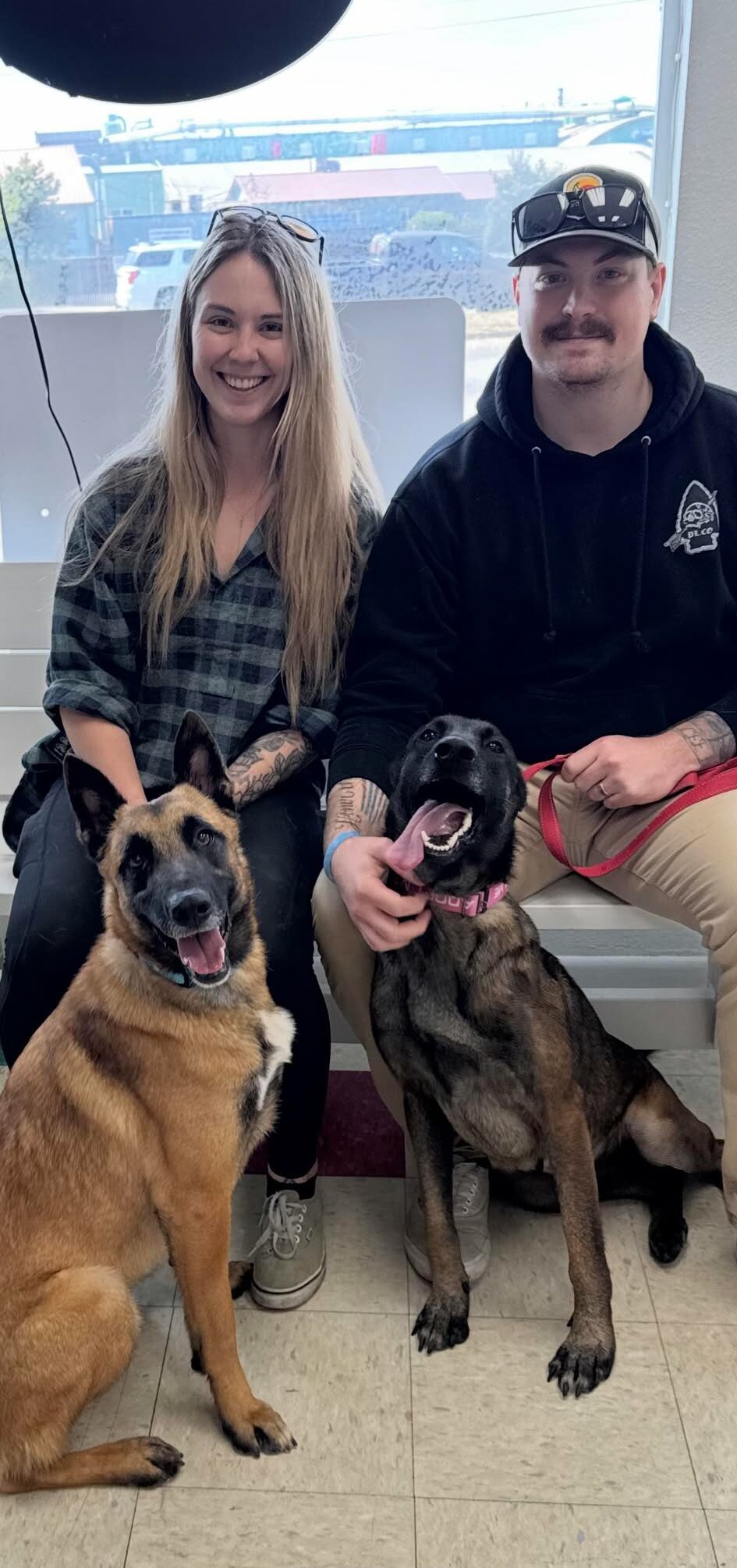 couple and two dogs