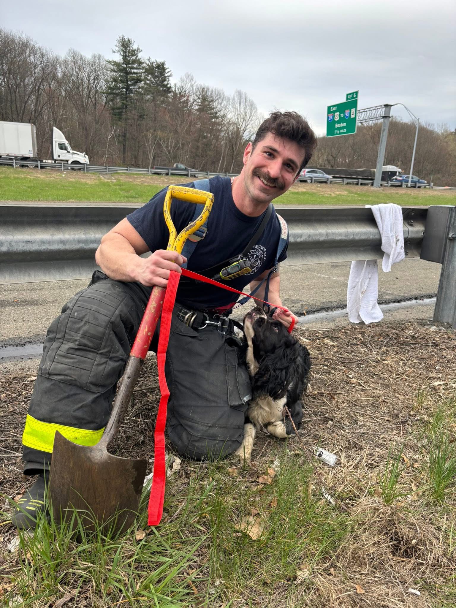 man with shovel and dog