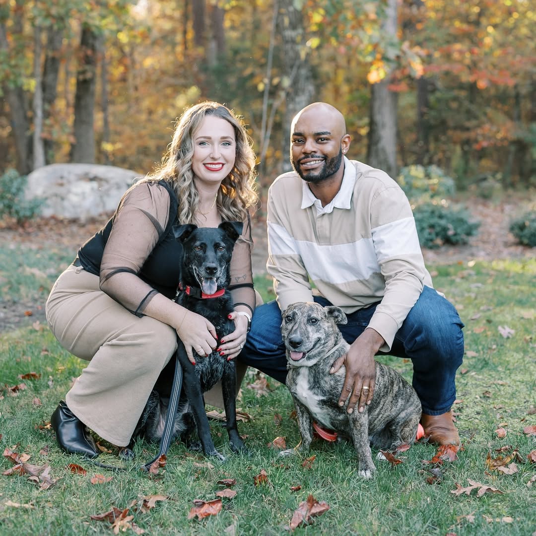 two dogs and couple