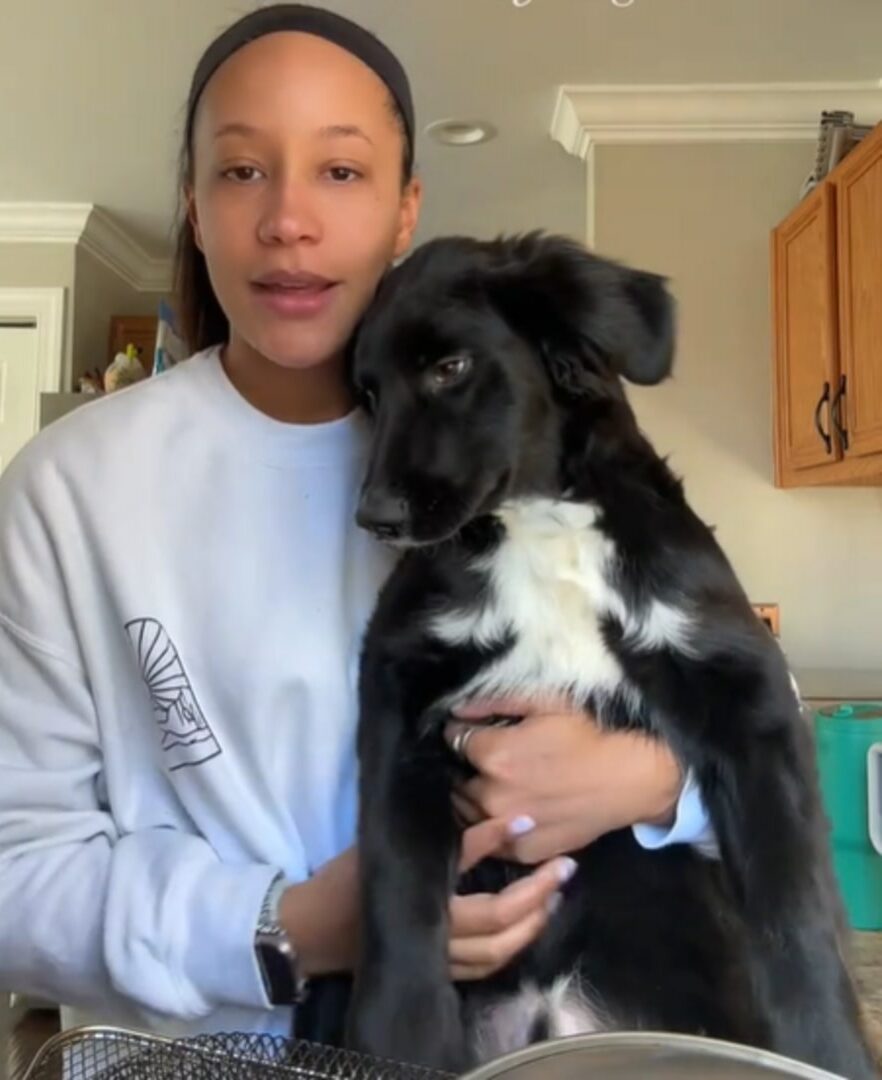 woman and Labrador