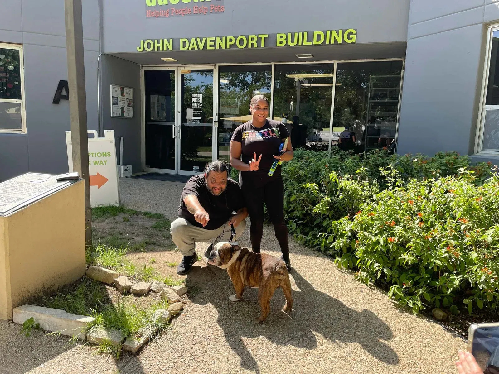 couple and dog