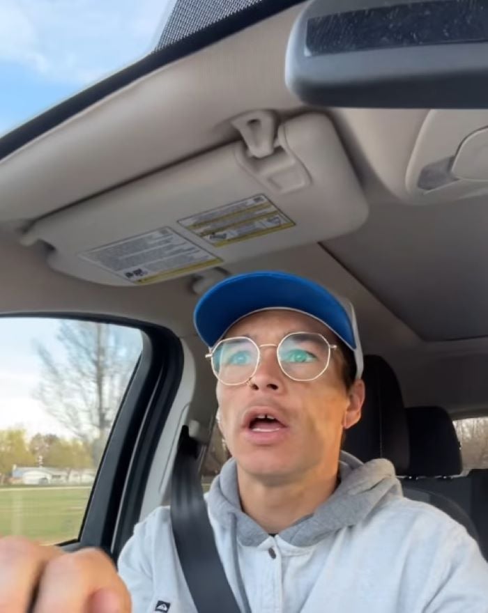 man in car