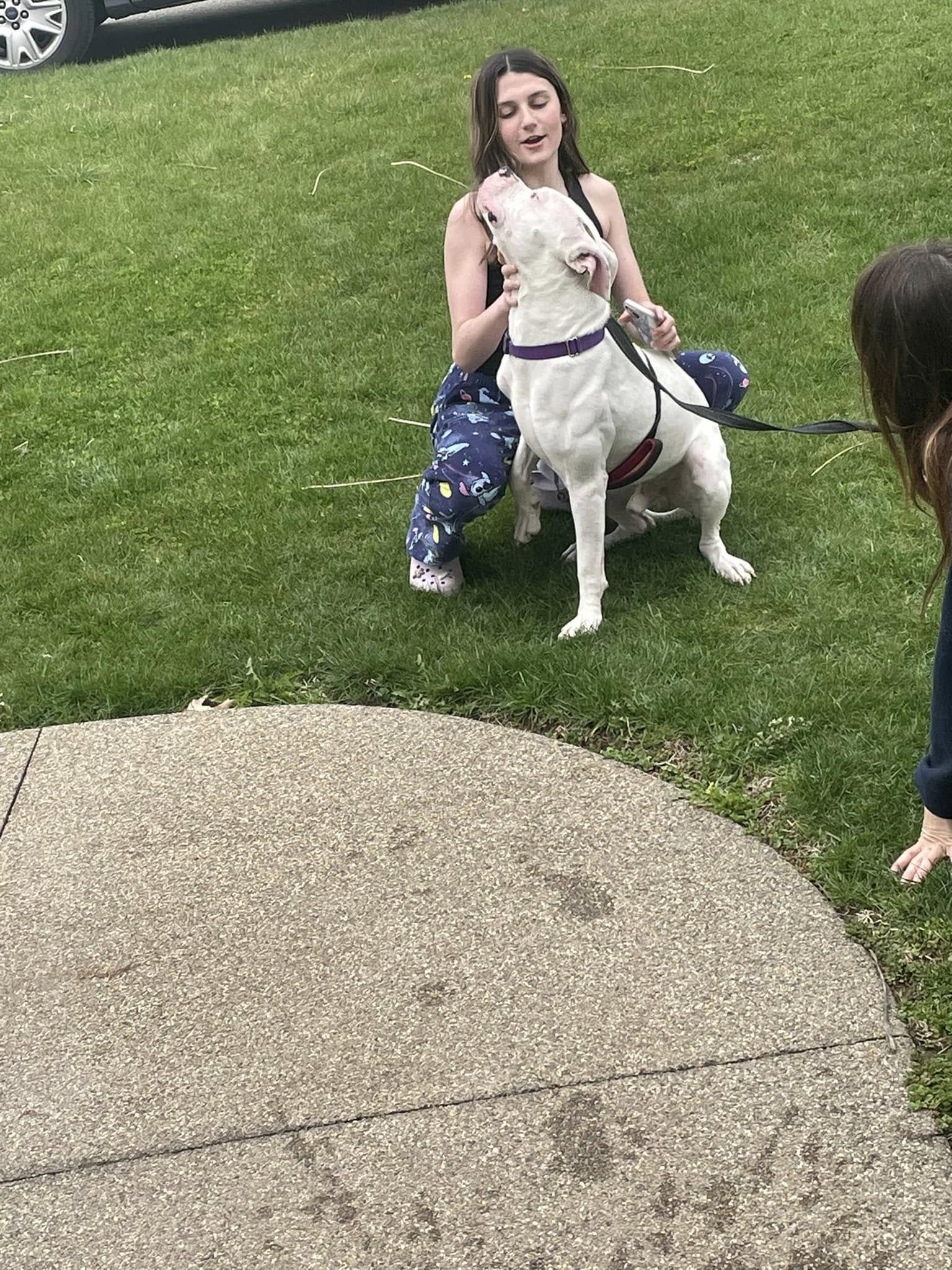 two girls and dog