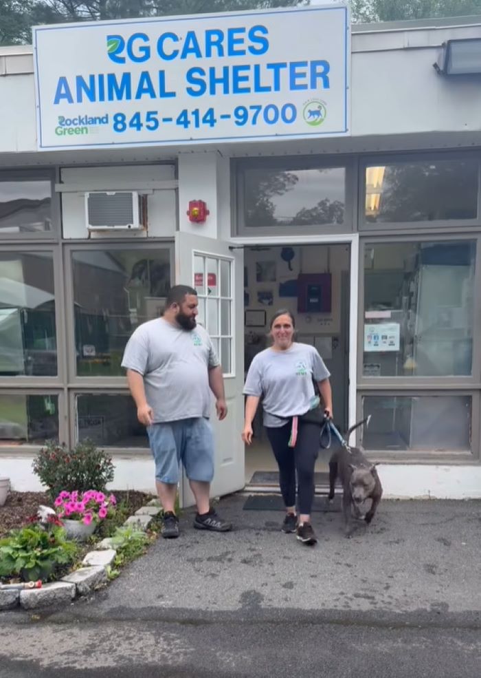 couple and dog