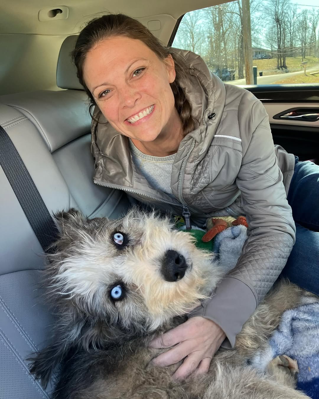 woman and blind dog