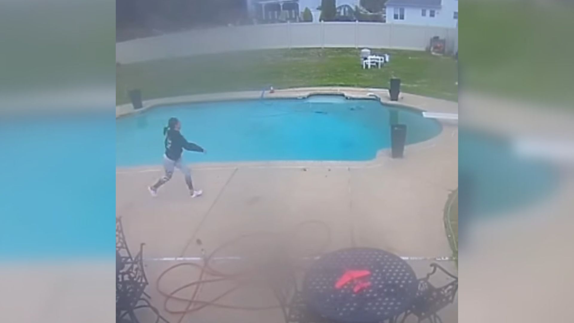 man and dog near pool