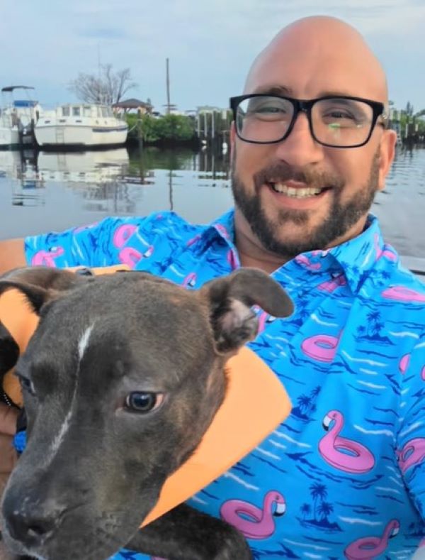 bald man and dog