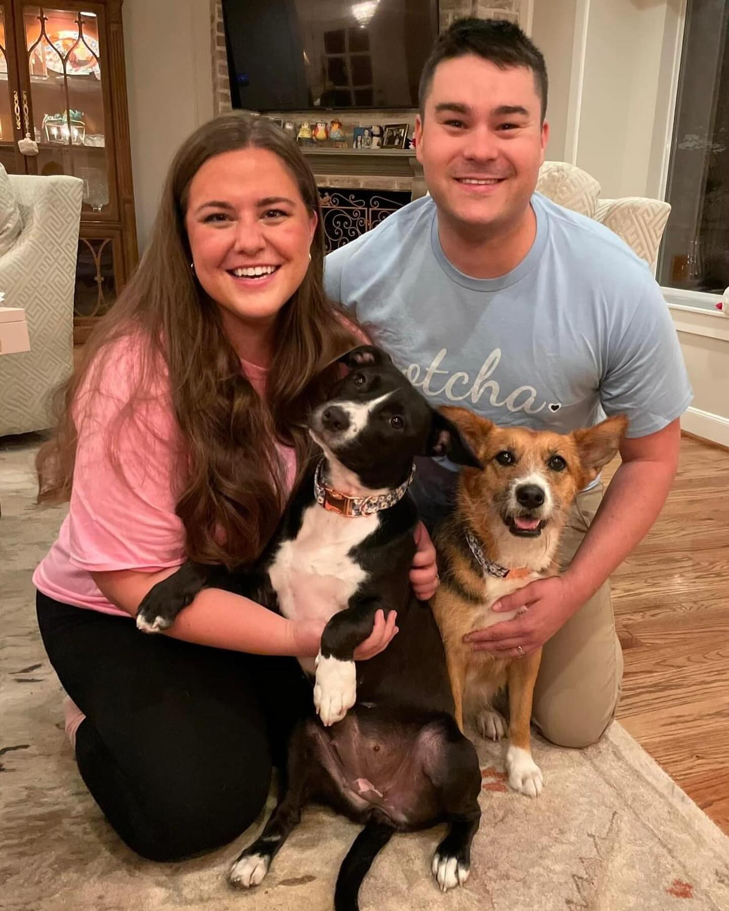 couple and two dogs