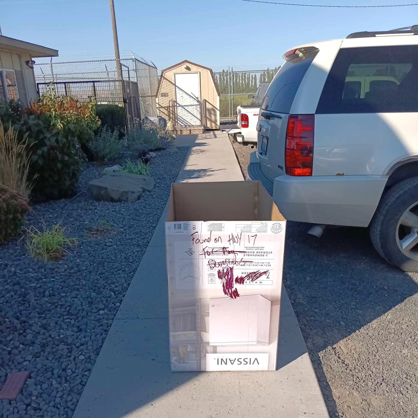 Cardboard box on sidewalk