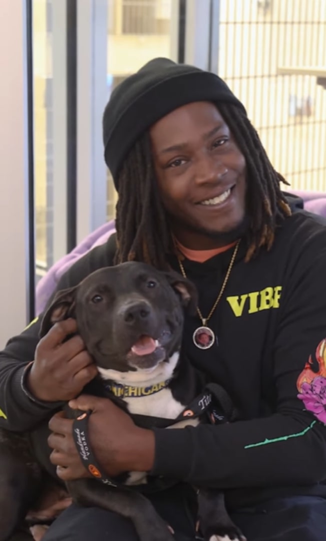 black man and dog