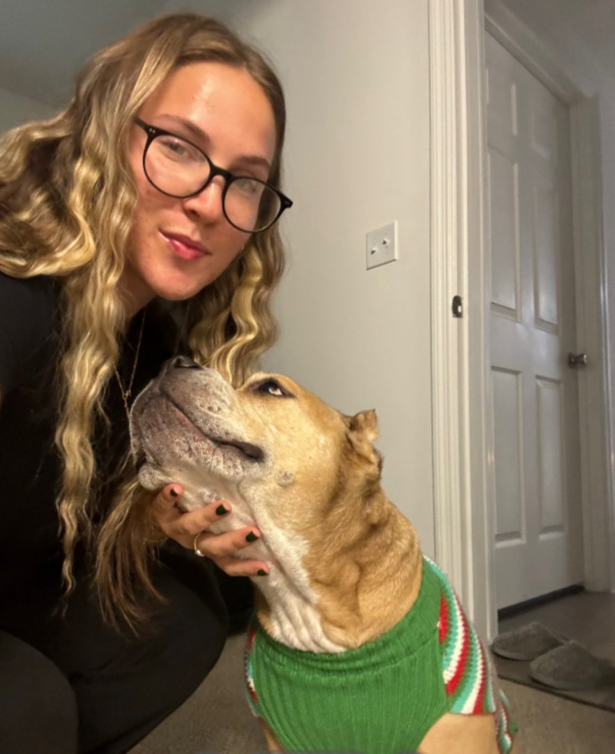 blonde woman with adopted dog