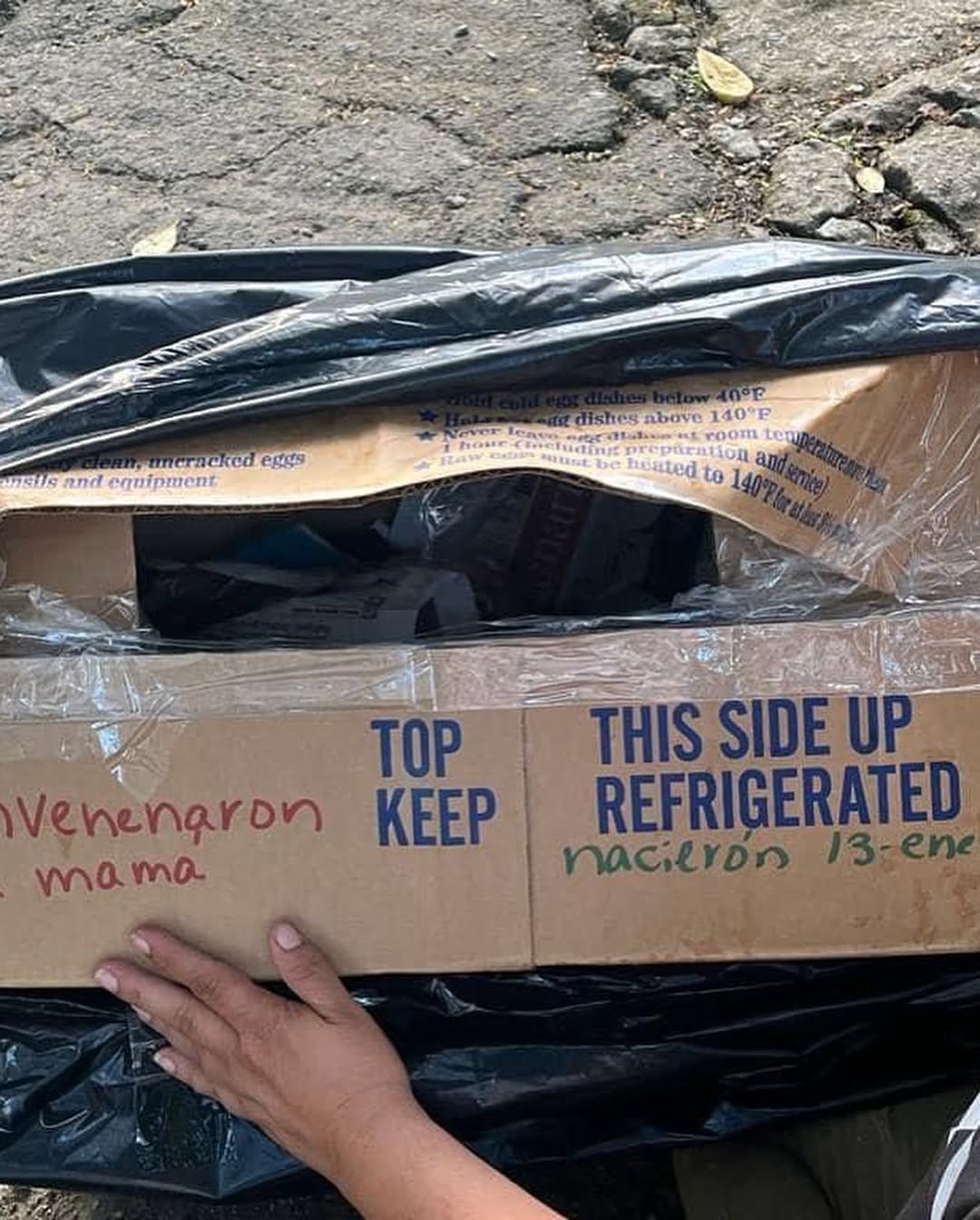 box in trash bag