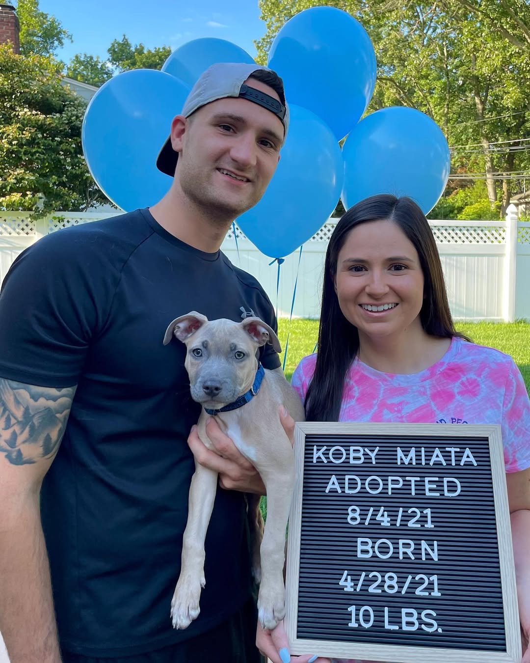 couple and cute dog