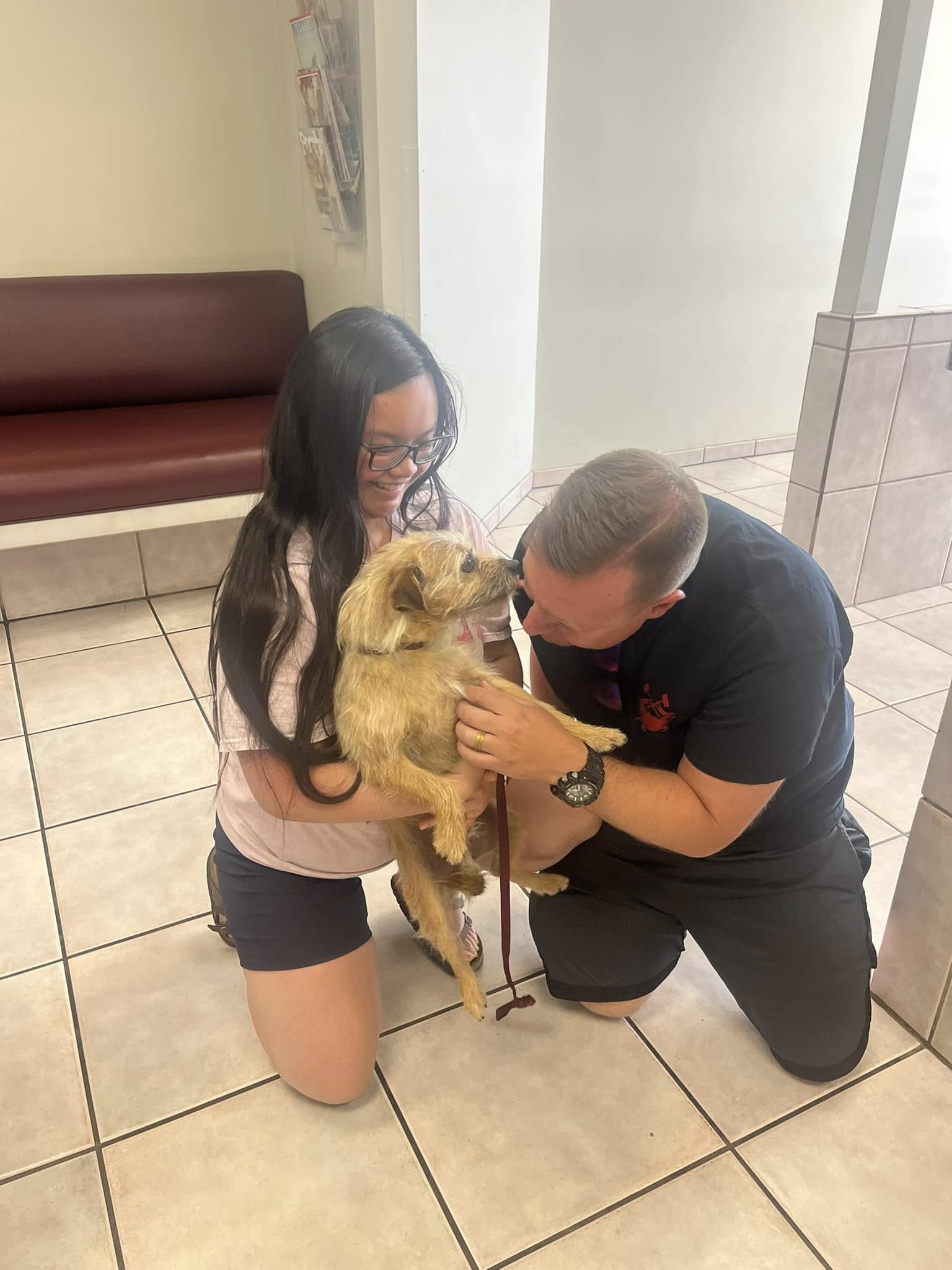 couple and cute dog