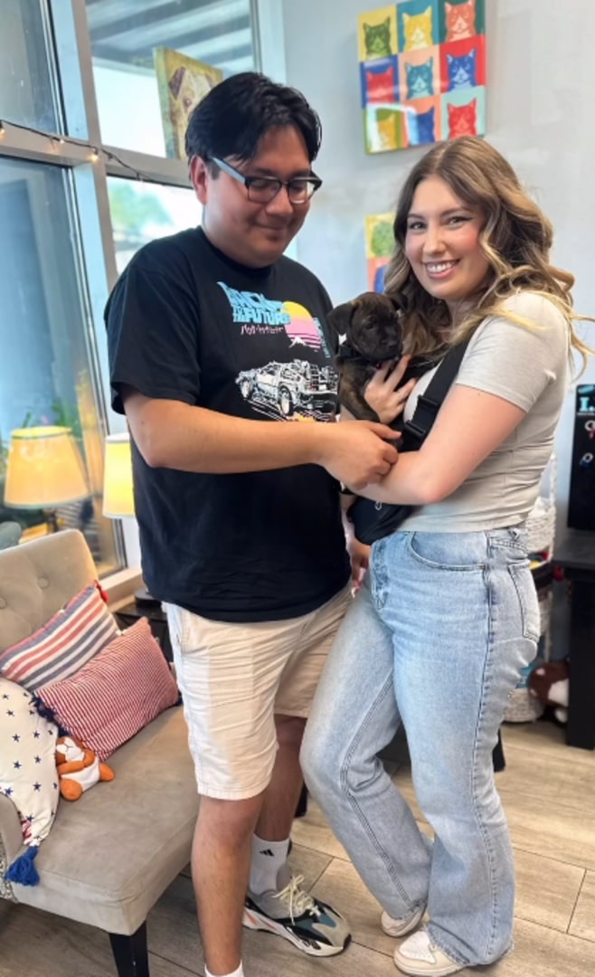 couple and dog
