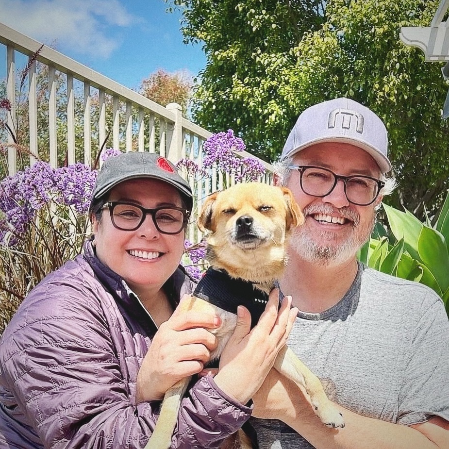 couple and sweet dog