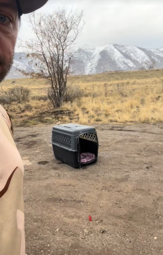man and crate on road