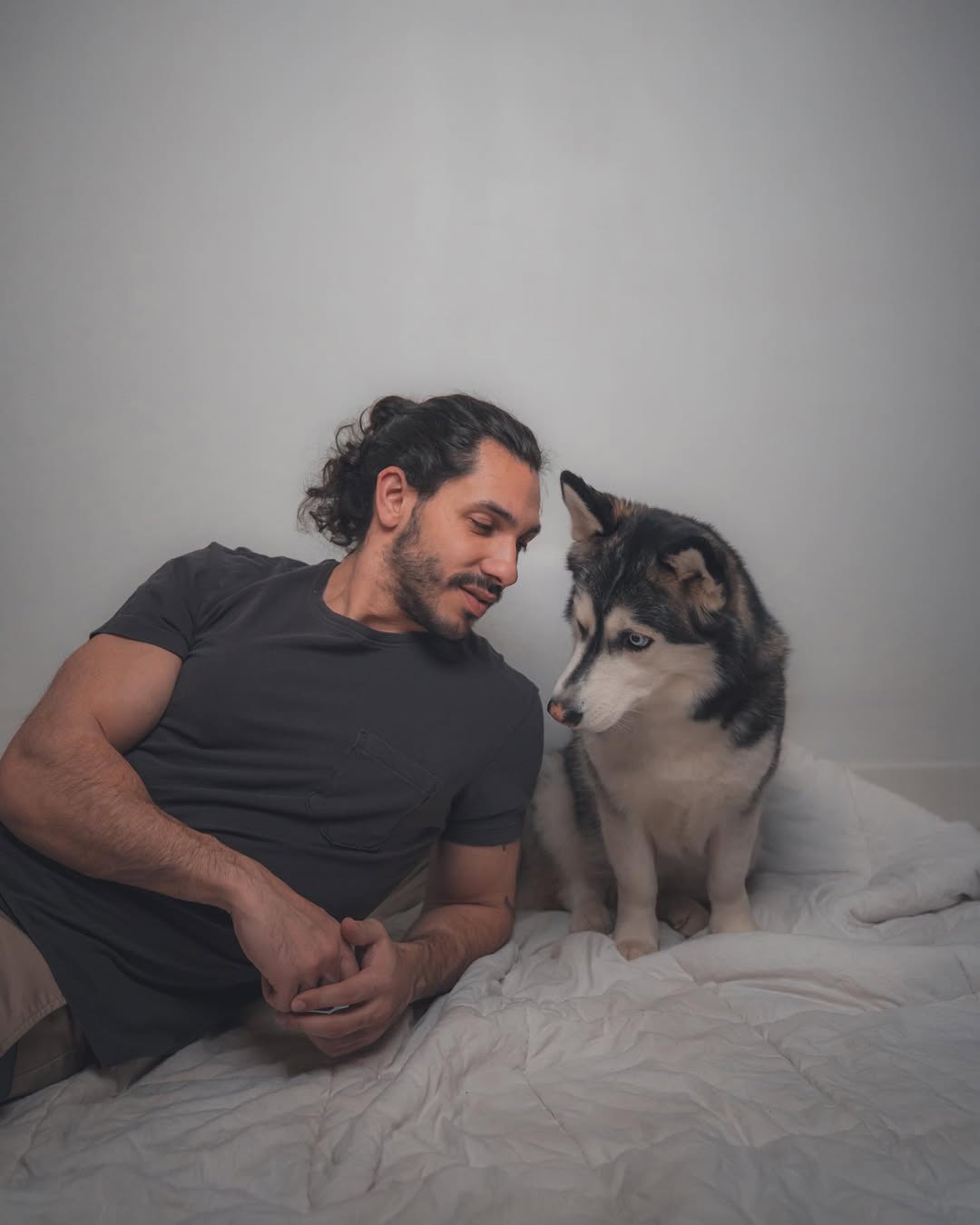 man and husky mix