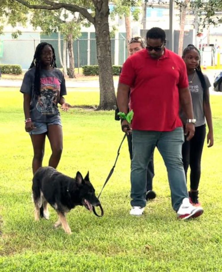man walking with his dog