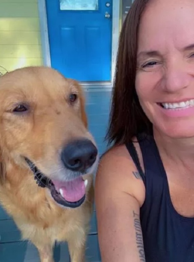 middle aged woman and brown dog