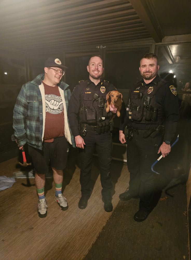 officers and tiny dog