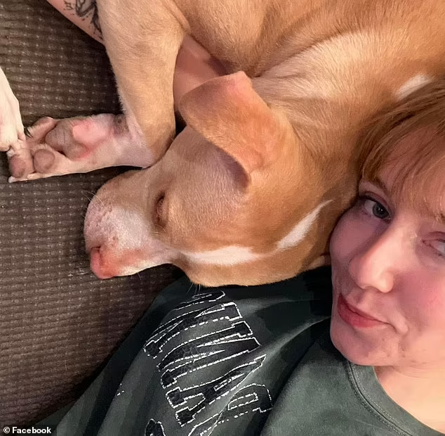 woman and dog laying down