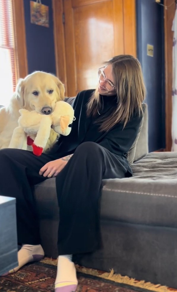woman and golden retriever