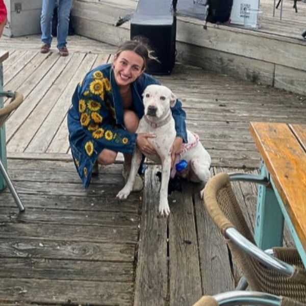 woman and white dog