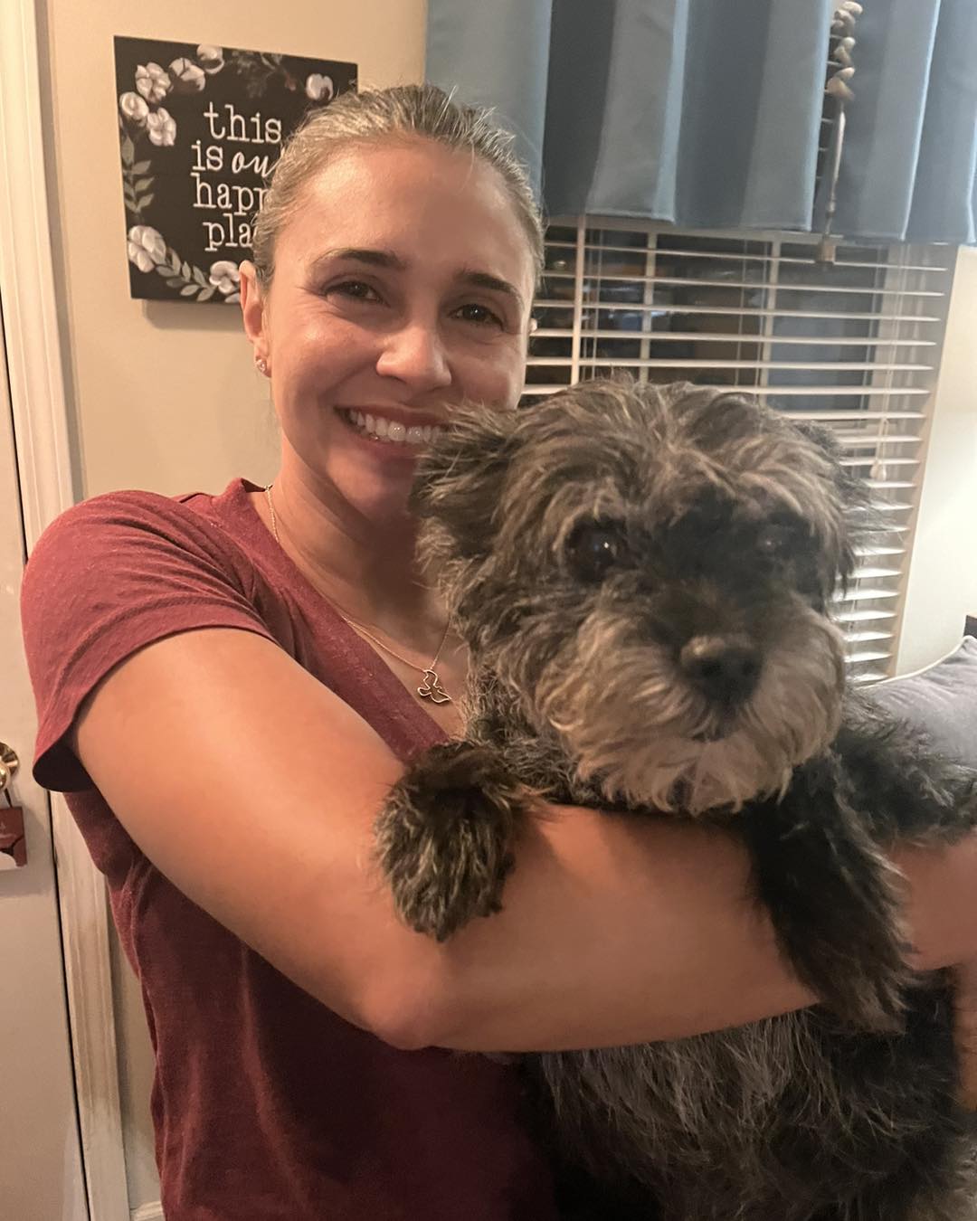 woman hugging a dog