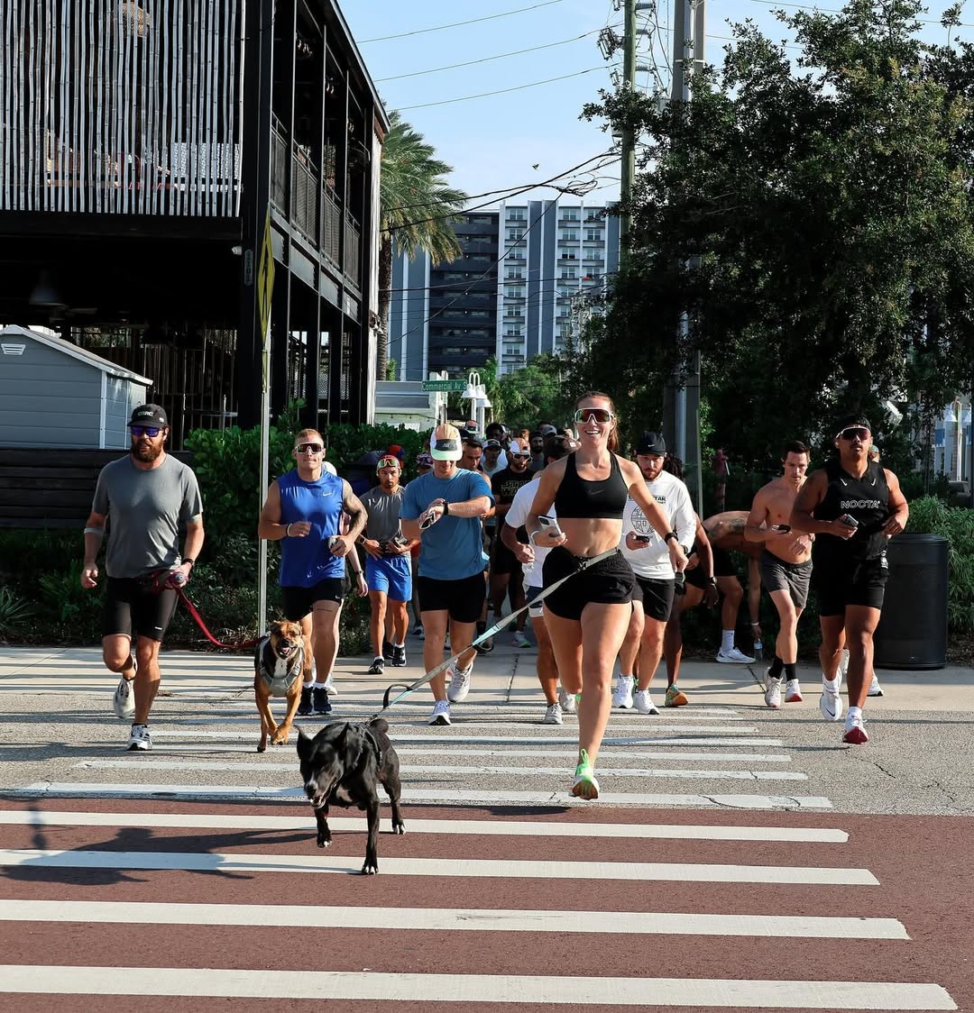 woman running with dog