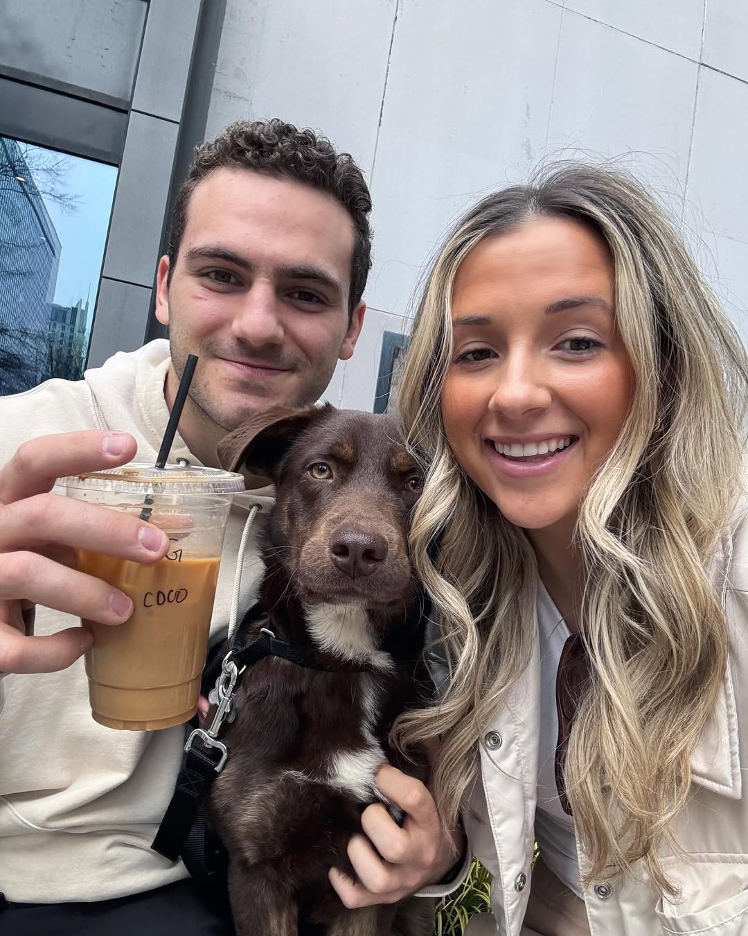young couple and dog