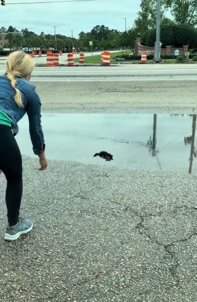 blonde woman and tiny animal