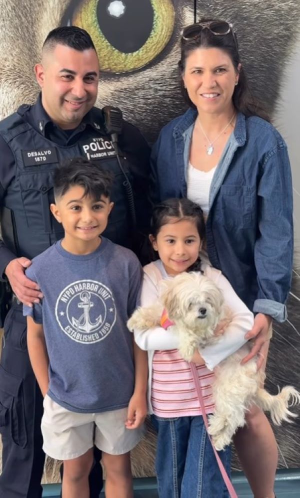 family and white dog
