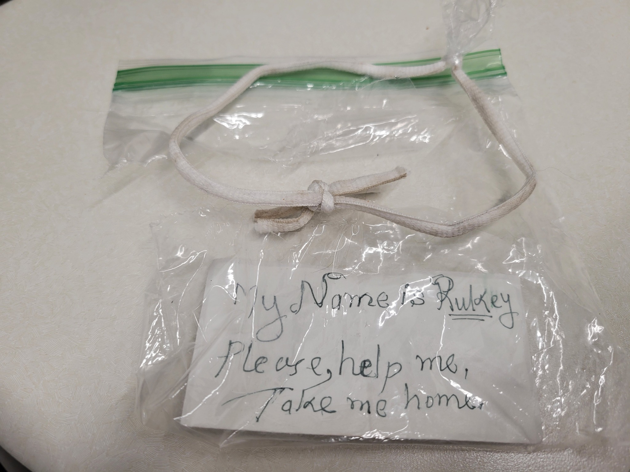 handwritten note in a ziplock bag
