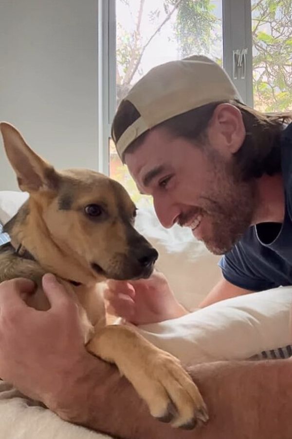 man and cute dog