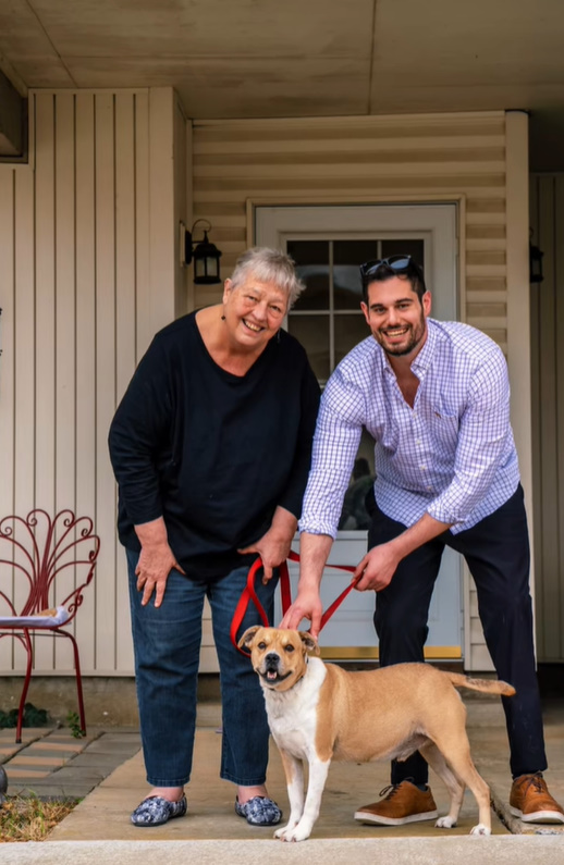 man, woman and dog