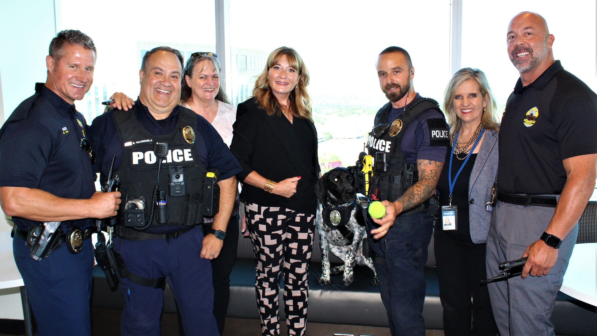 police dog with his handlers