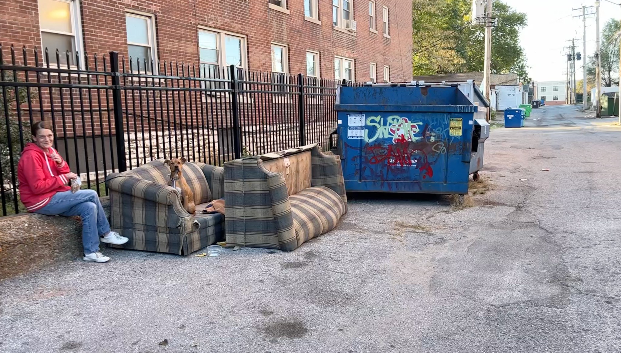 puppy dumped beside the dumpster 