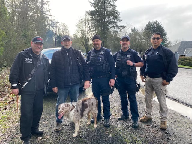 rescuers and saved dog 