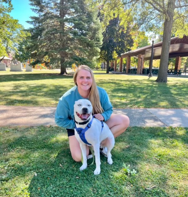 woman and her white dog