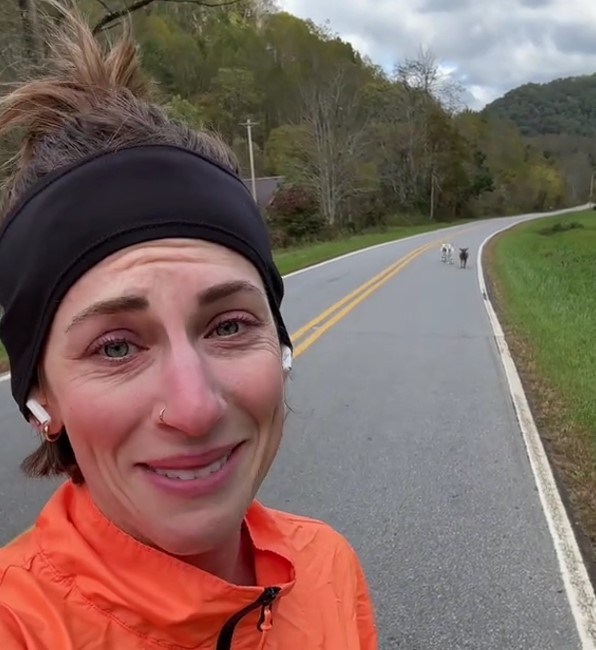 woman jogging on road