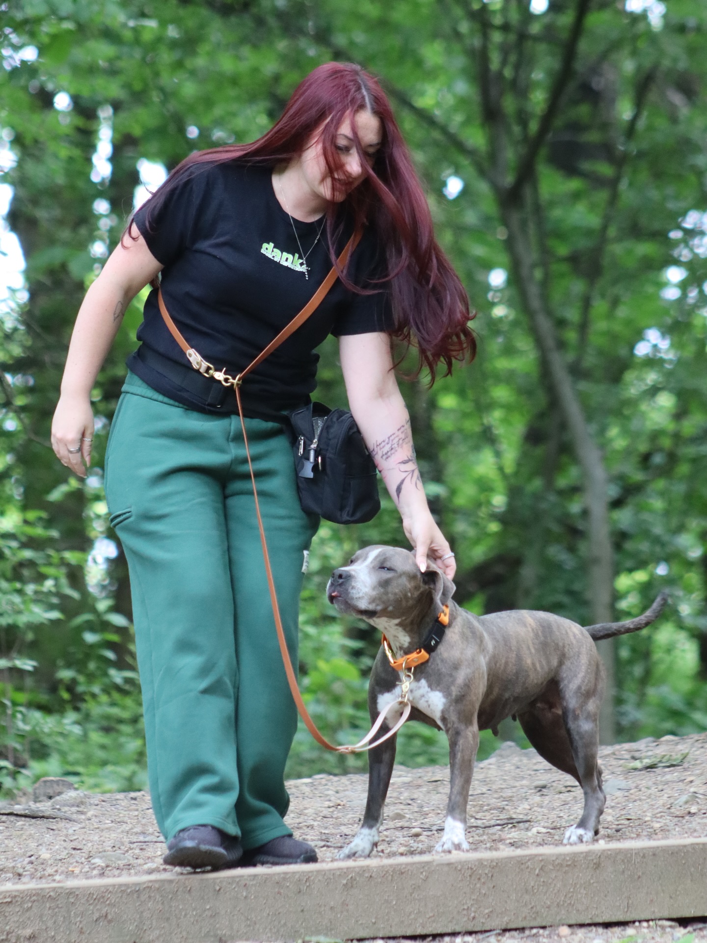 woman walking with dog