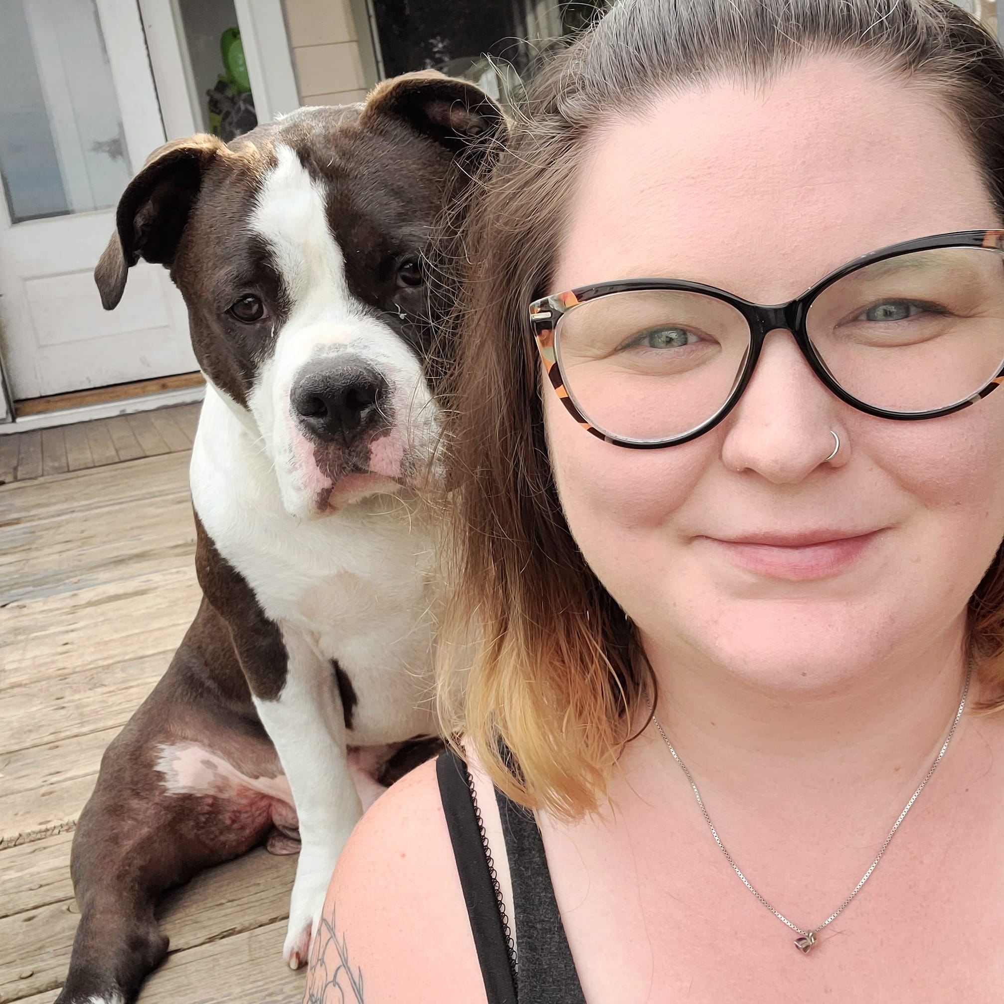 woman and glasses and a dog