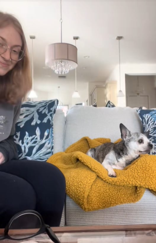 woman with glasses and dog