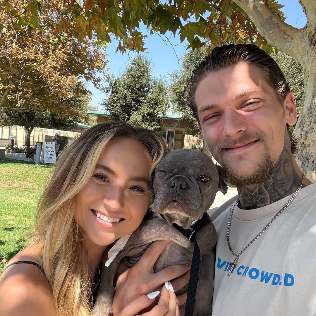 Happy dog and couple