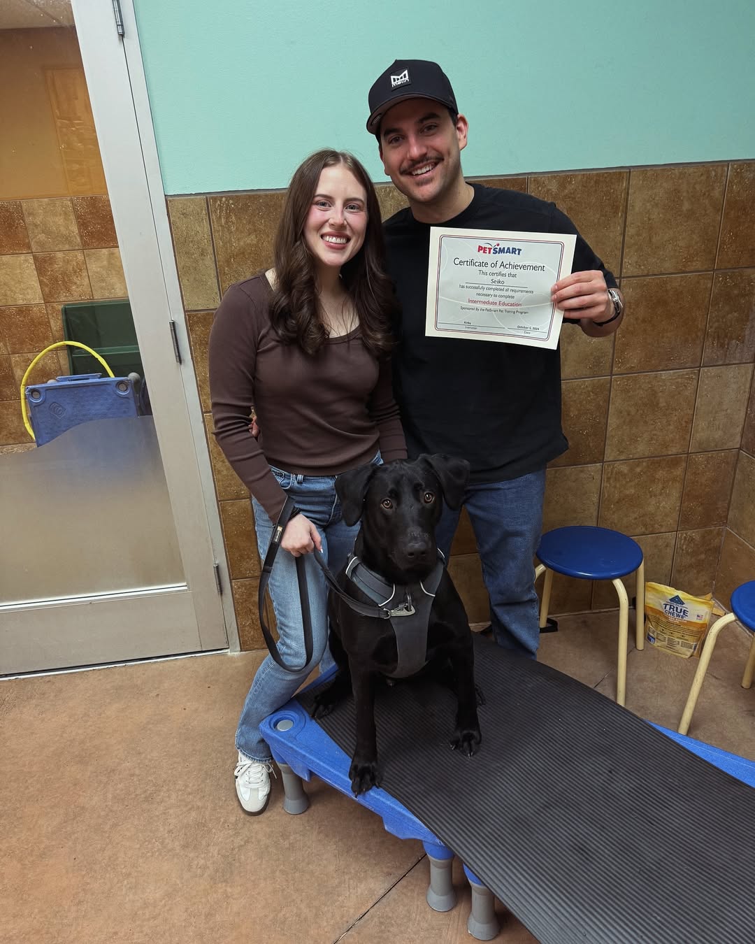 couple and adopted dog