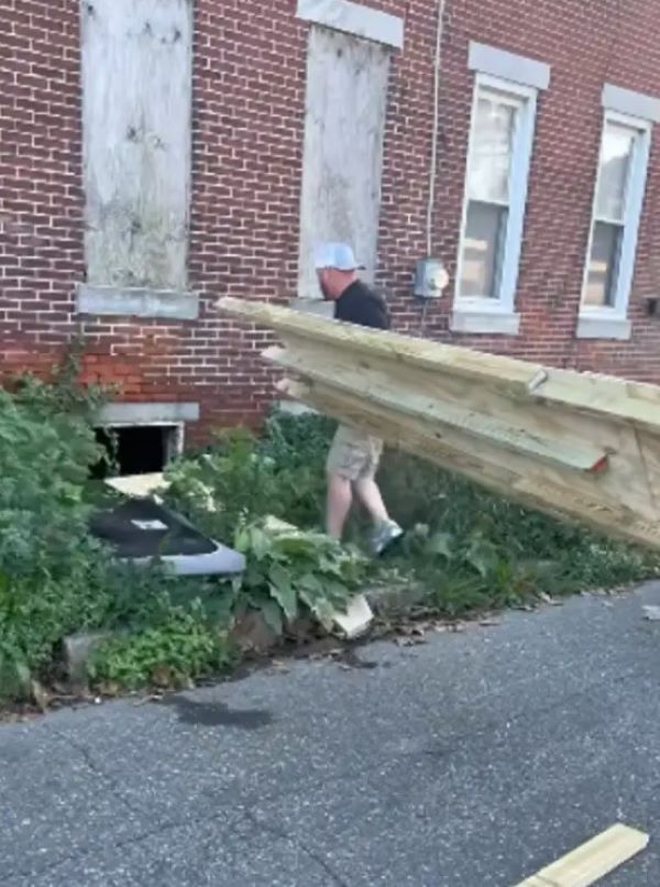 man holding a planks
