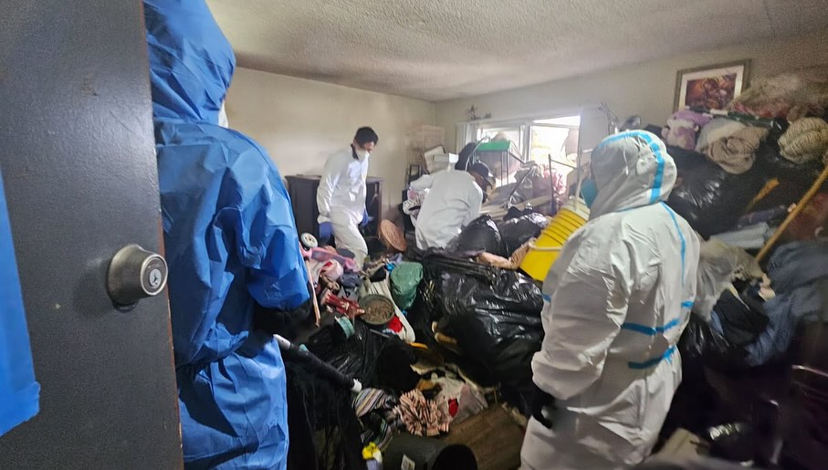 people in messy apartment